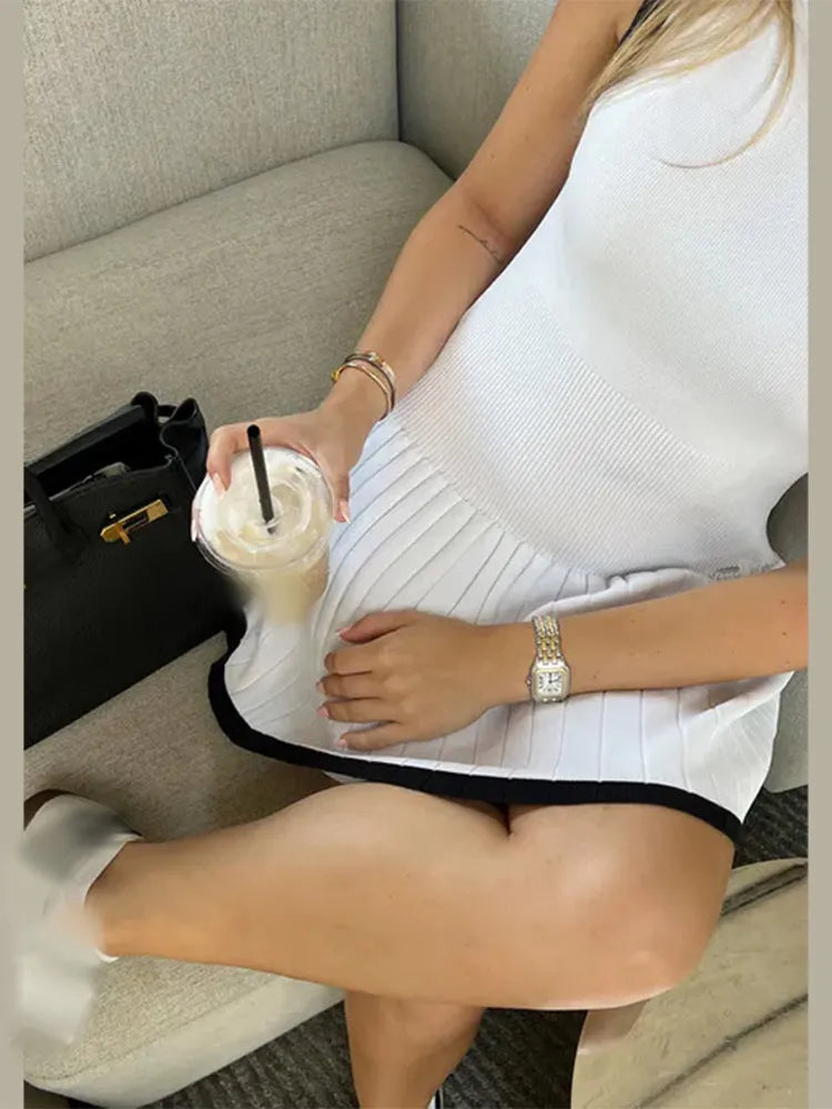 Women's Sleeveless Pleated Mini Dress – High Neck – Fitted Bodice – Elegant Casual Wear by Lumina Vancouver