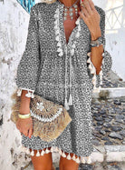 Women's Bohemian Mini Dress - V-Neck Tassel Detail - Bell Sleeve Floral Casual Wear by Lumina Vancouver